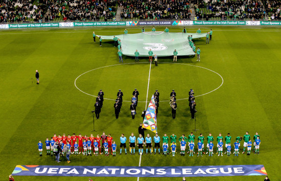 Ireland and Wales stand for the National Anthems