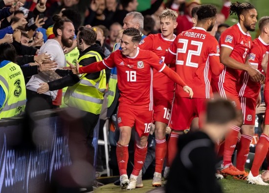 Harry Wilson celebrates scoring with fans