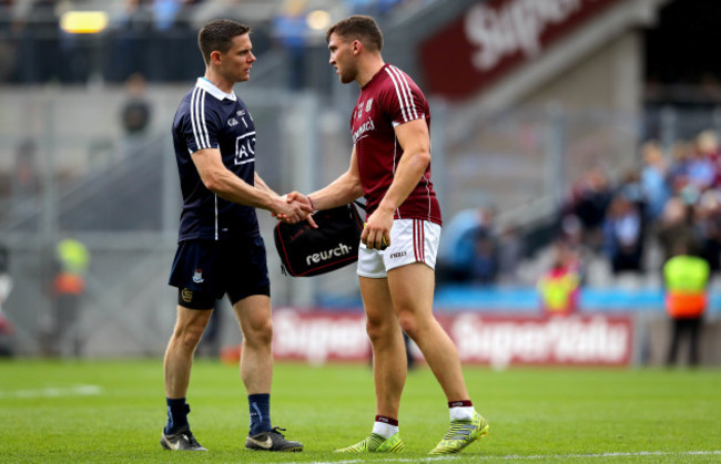 Stephen Cluxton with Damien Comer