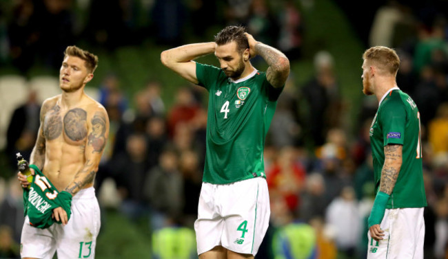 Jeff Hendrick, Shane Duffy and James McClean dejected after the game
