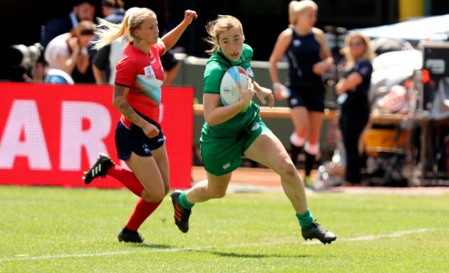 Ireland's Eve Higgins runs in to score a try