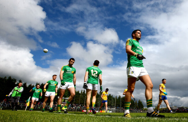 Emlyn Mulligan parades with his team