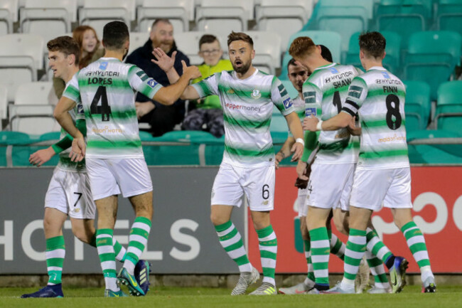 Greg Bolger celebrates his side's goal with Roberto Lopes