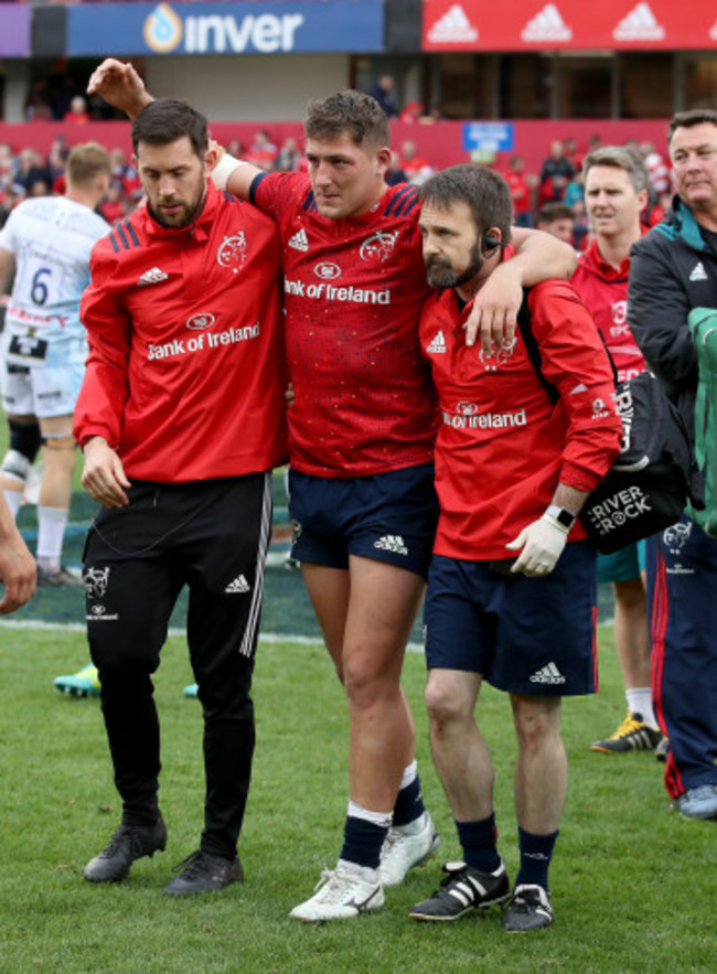 Dan Goggin leaves the field with an injury after the game