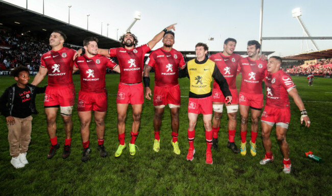 Toulouse players celebrate after the game