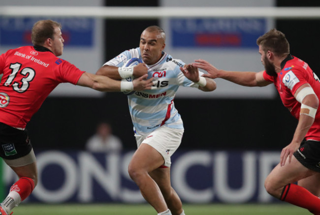 Racing 92's Simon Zebo is tackled by Ulster’s Will Addison and  Stuart McCloskey
