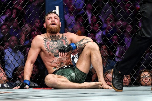 Conor McGregor dejected after losing