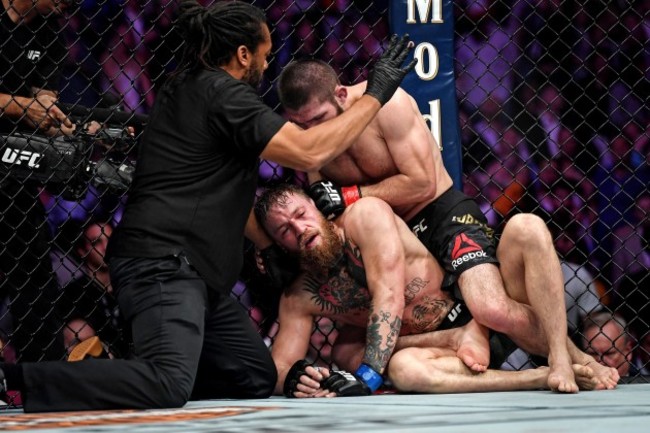 Khabib Nurmagomedov submits Conor McGregor in the fourth round to win