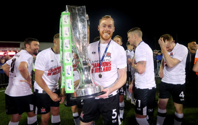 Chris Shields celebrates with the trophy