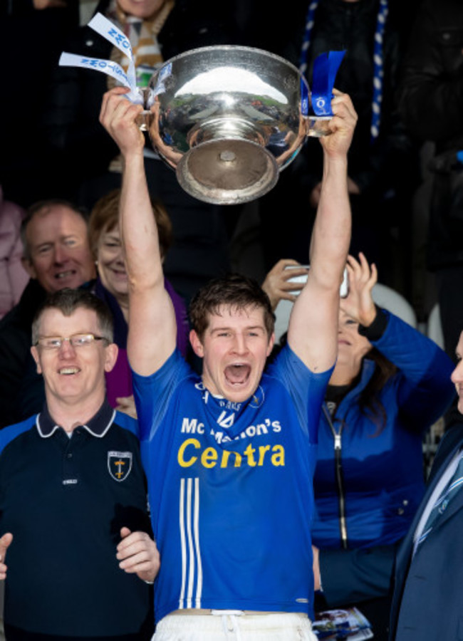 Darren Hughes raises the Mick Duffy Cup