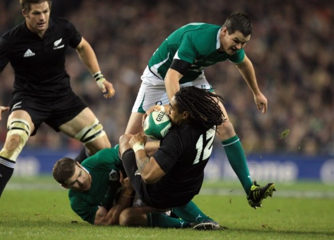 Jonathan Sexton and Gordon D'Arcy tackle Ma'a Nonu