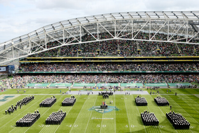 Members of the Navy Midshipmen take to the field before the game