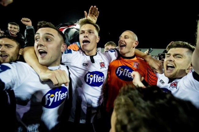 Dylan Connolly, Daniel Cleary, Gary Rogers and Ronan Murray celebrate winning the league