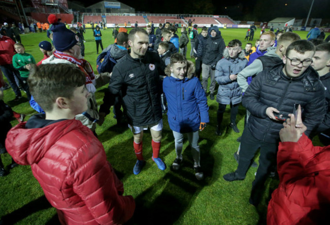 Conan Byrne with fans after the game