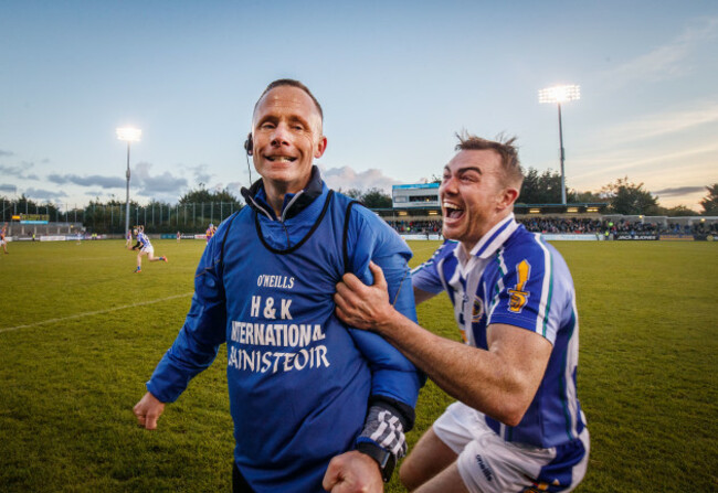 Joe Fortune celebrates at the final whistle with Simon Lambert