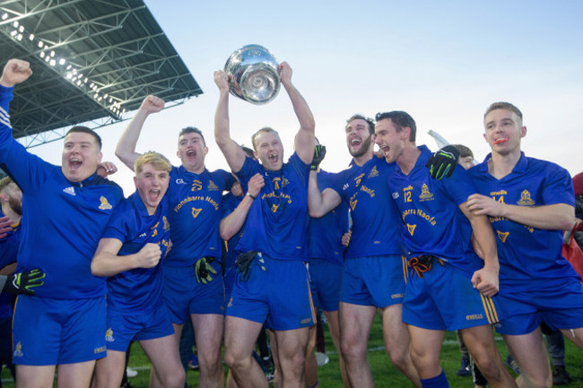 Michael Shields celebrates with the trophy