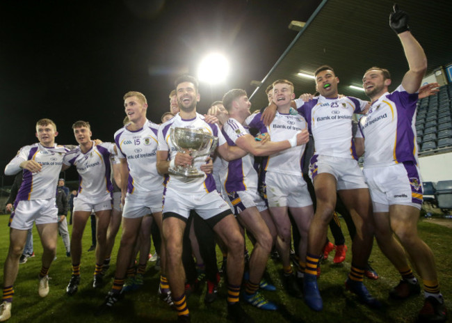 Kilmacud Crokes players celebrate with the trophy