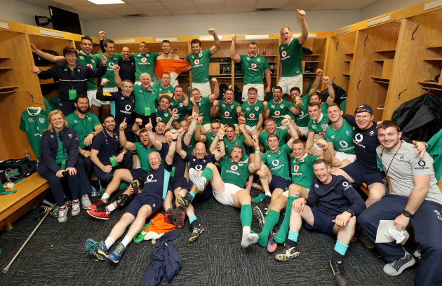 The Ireland team and management celebrate winning