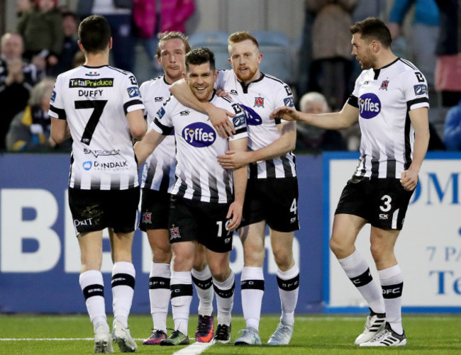 Ronan Murray celebrates scoring a goal with his team mates