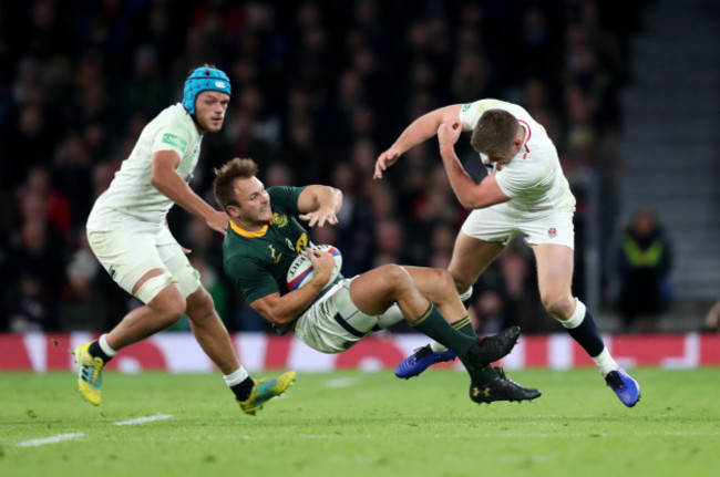 Owen Farrell tackles Andr&eacute; Esterhuizen in the final moments of the game