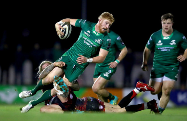 Darragh Leader tackled by Richard Hibbard and Will Talbot-Davies