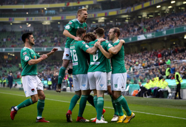 Kieran Sadlier celebrates scoring with his teammates