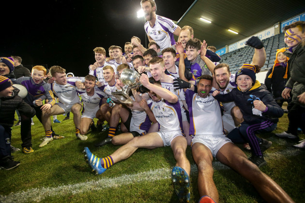 Kilmacud Crokes players celebrate with the trophy