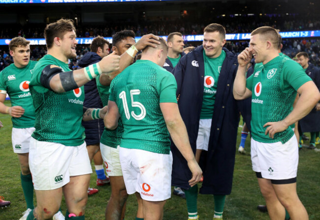 Andrew Porter and Bundee Aki congratulate Jordan Larmour after the game
