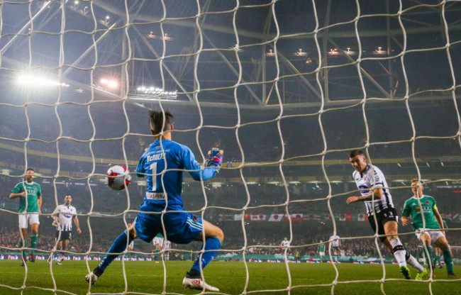 Patrick McEleney scores their second goal of the game past Mark McNulty