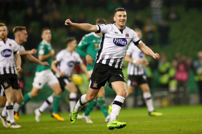 Patrick McEleney celebrates at the final whistle