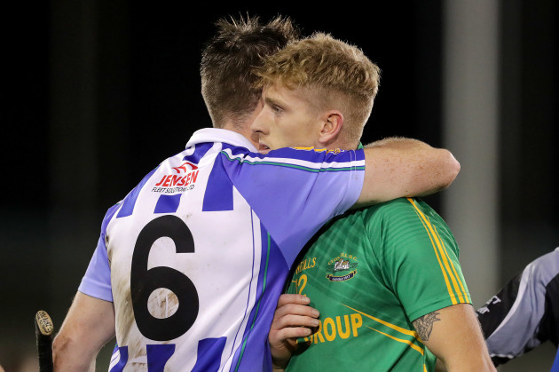 Simon Lambert consoles Luke Loughlin after the game