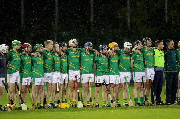 Clonkill players line up for a minute of silence