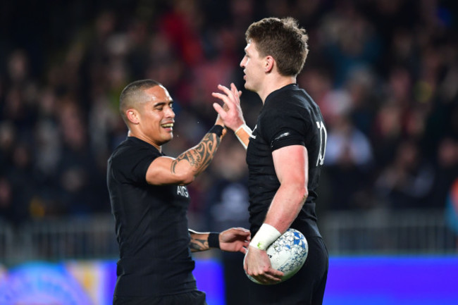 Beauden Barrett celebrates scoring a try with TJ Perenara