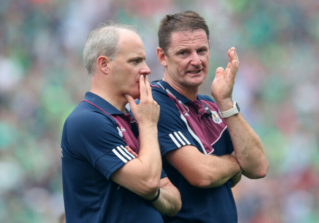 Michael Donoghue and Noel Larkin dejected at the end of the game