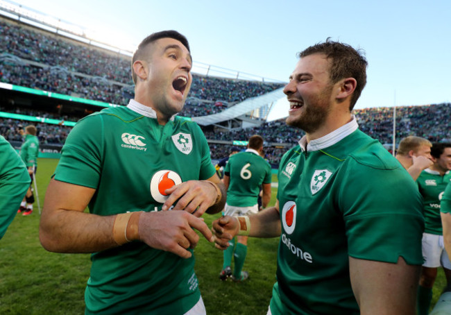 Conor Murray and Robbie Henshaw celebrate winning