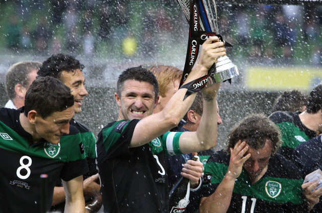 Robbie Keane with the trophy