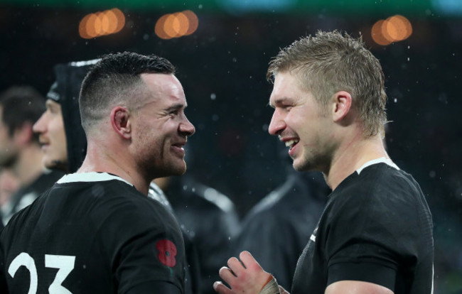 Ryan Crotty and Jack Goodhue celebrate after the game