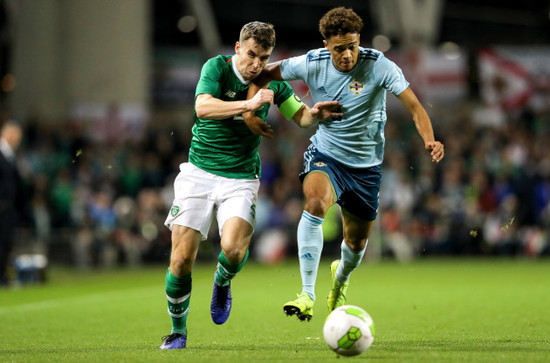 Seamus Coleman with Jamal Lewis