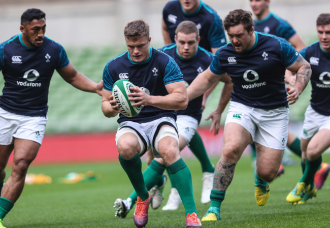 Josh van der Flier with Bundee Aki and Andrew Porter