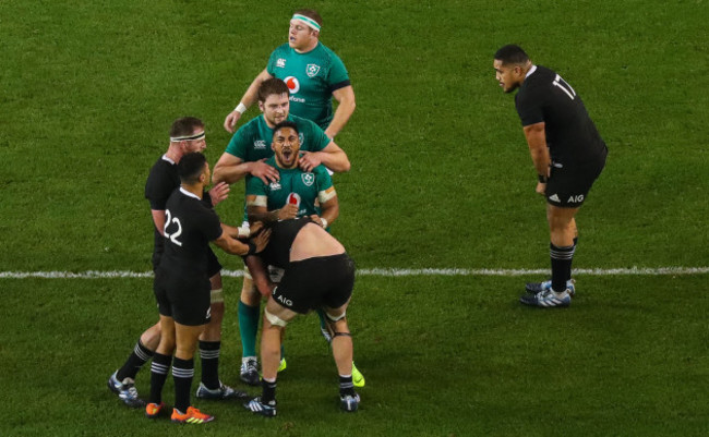 Bundee Aki, Iain Henderson and Sean Cronin celebrate at the final whistle