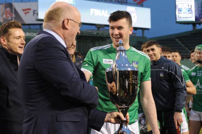 Declan Hannon is presented with the trophy by GAA President John Horan Classic