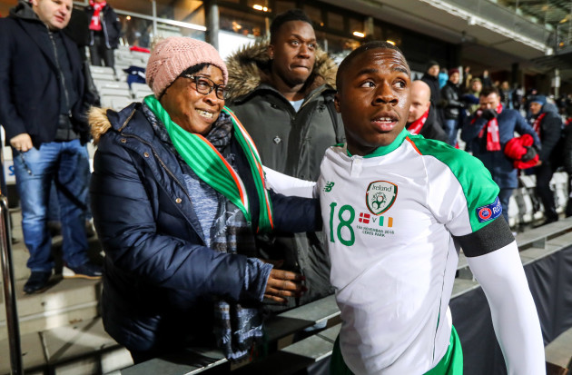 Michael Obafemi with his mother Bola and brother Affy after the game