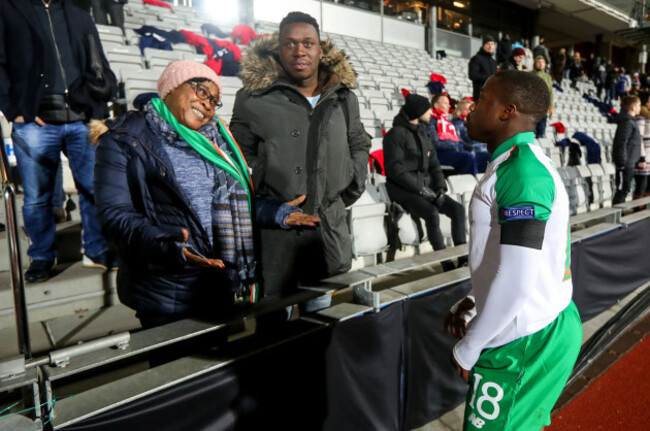 Michael Obafemi with his mother Bola and brother Affy after the game