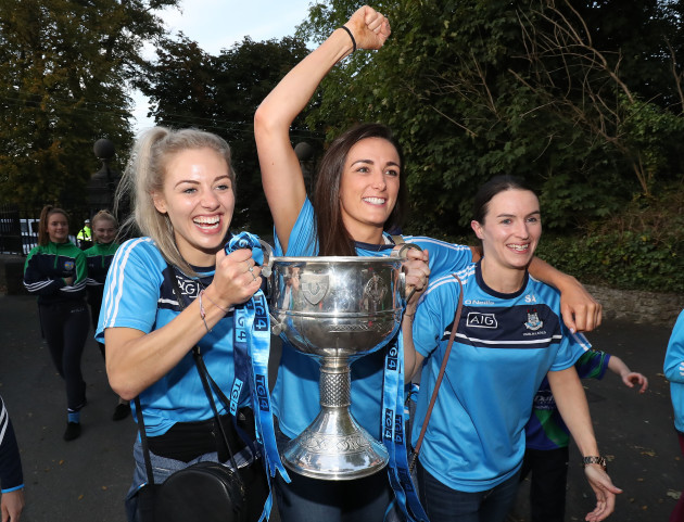 Nicole Owens, Sinead Aherne and Niamh McEvoy arrive with the cup