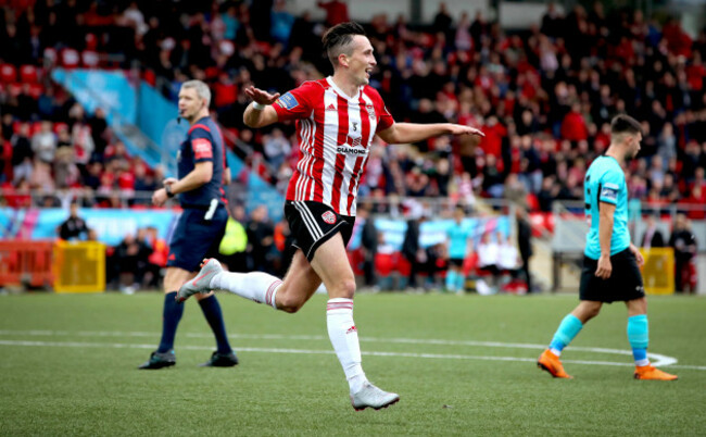 Aaron McEneff celebrates scoring their third goal with  penalty