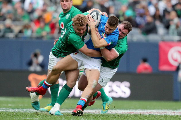 Luca Sperandio tackled by Finlay Bealham and Dave Kilcoyne