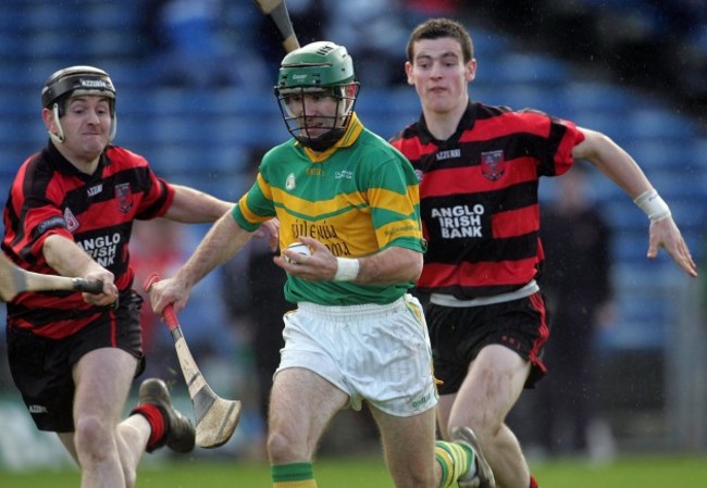 Jerry O'Connor of Newtownshandrum gets ahead of Fergal Hartley and Wayne Hutchinson of Ballygunner 4/12/2005