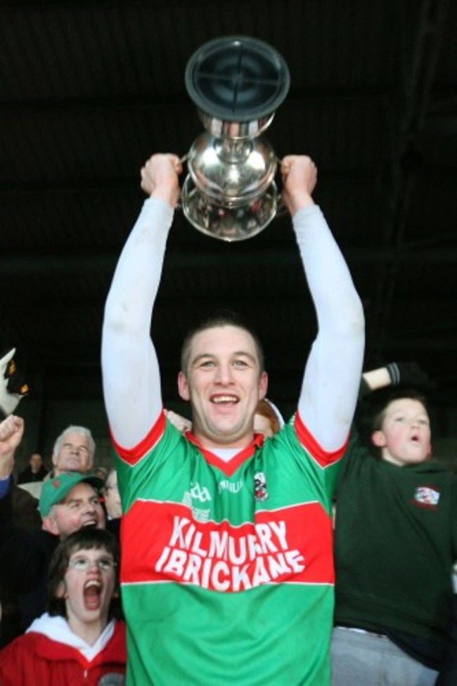 Enda Coughlan lifts the cup