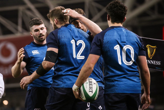 Stuart McCloskey celebrates his try with Sam Arnold and Joey Carbery