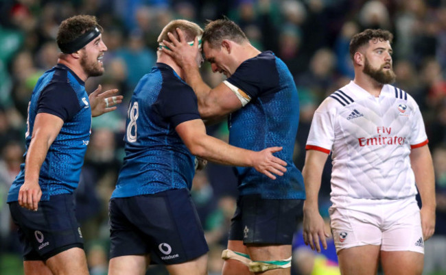 John Ryan celebrates scoring a try with Rhys Ruddock and Rob Herring